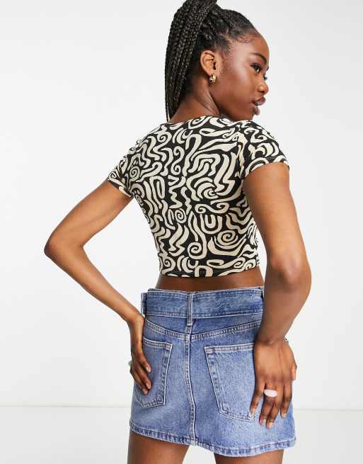 Monki crop top with cut outs and drawstring front in swirl print