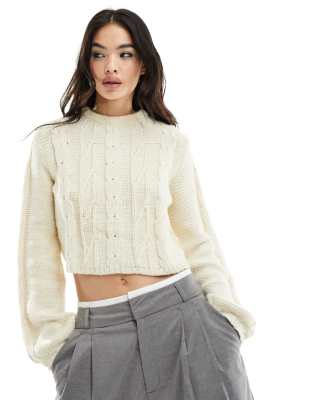 cropped cable knit sweater in cream-White