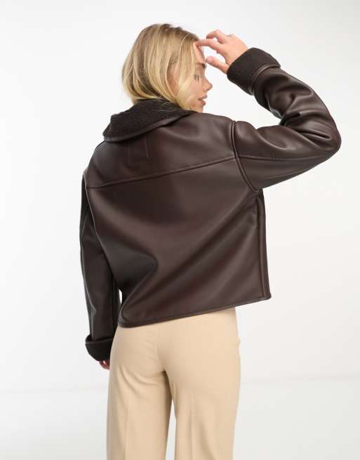 Monki cropped faux leather and shearling jacket in brown | ASOS