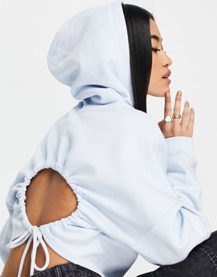 Monki cropped hoodie with open back in blue