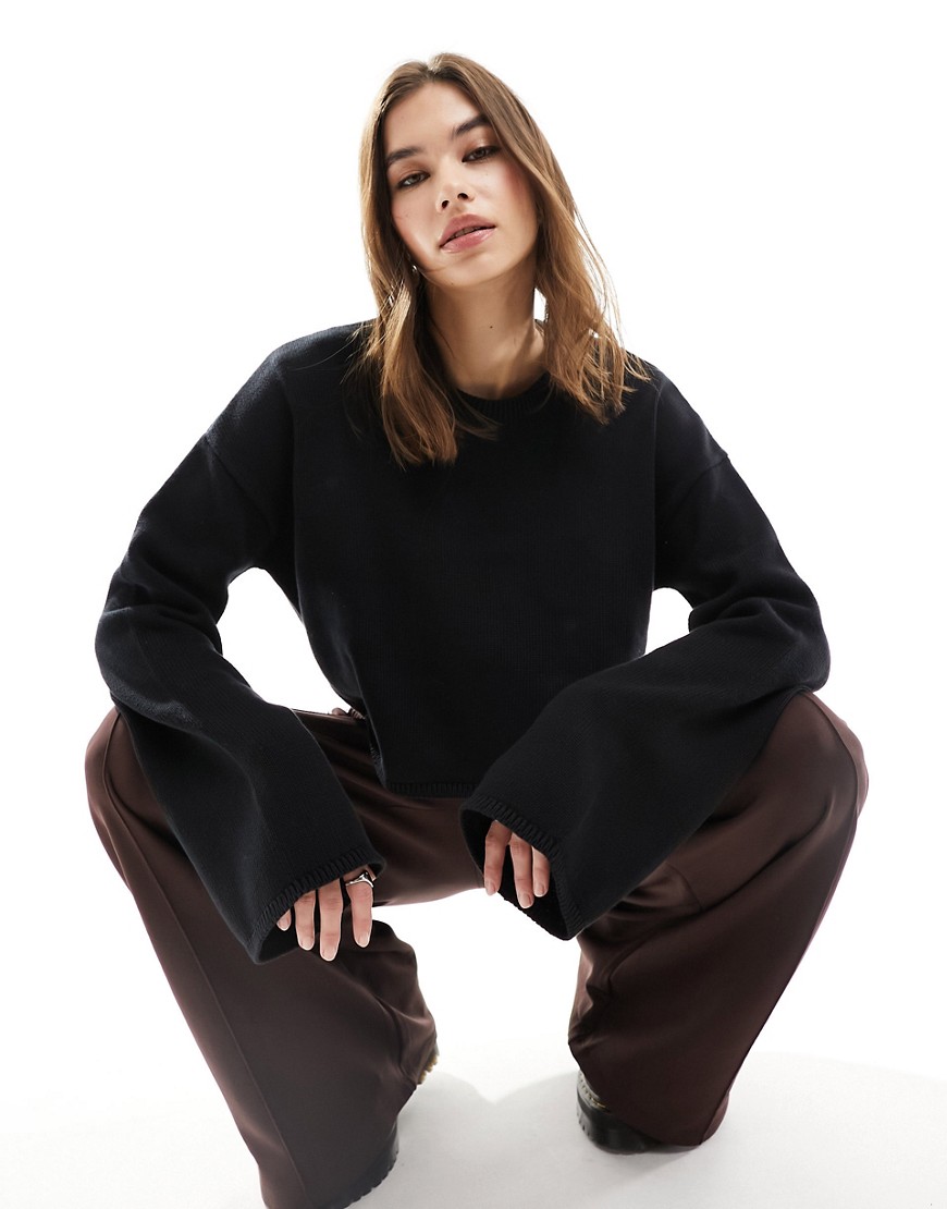 Monki cropped long sleeve knitted top in black