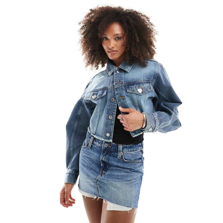 Monki cropped raw hem denim jacket in mid blue wash | ASOS