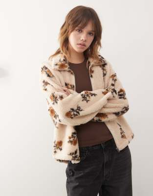 Monki Monki cropped zip up fleece with cinch toggle detail in white and brown floral print