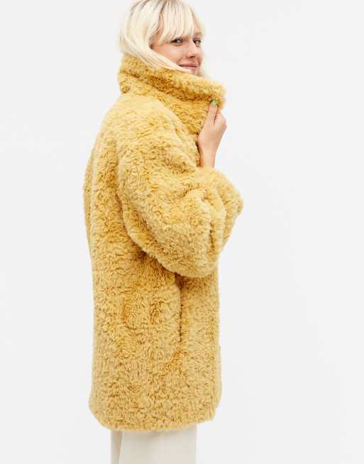 Curly hot sale fur coat