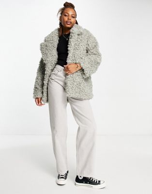 Monki curly faux fur jacket in grey