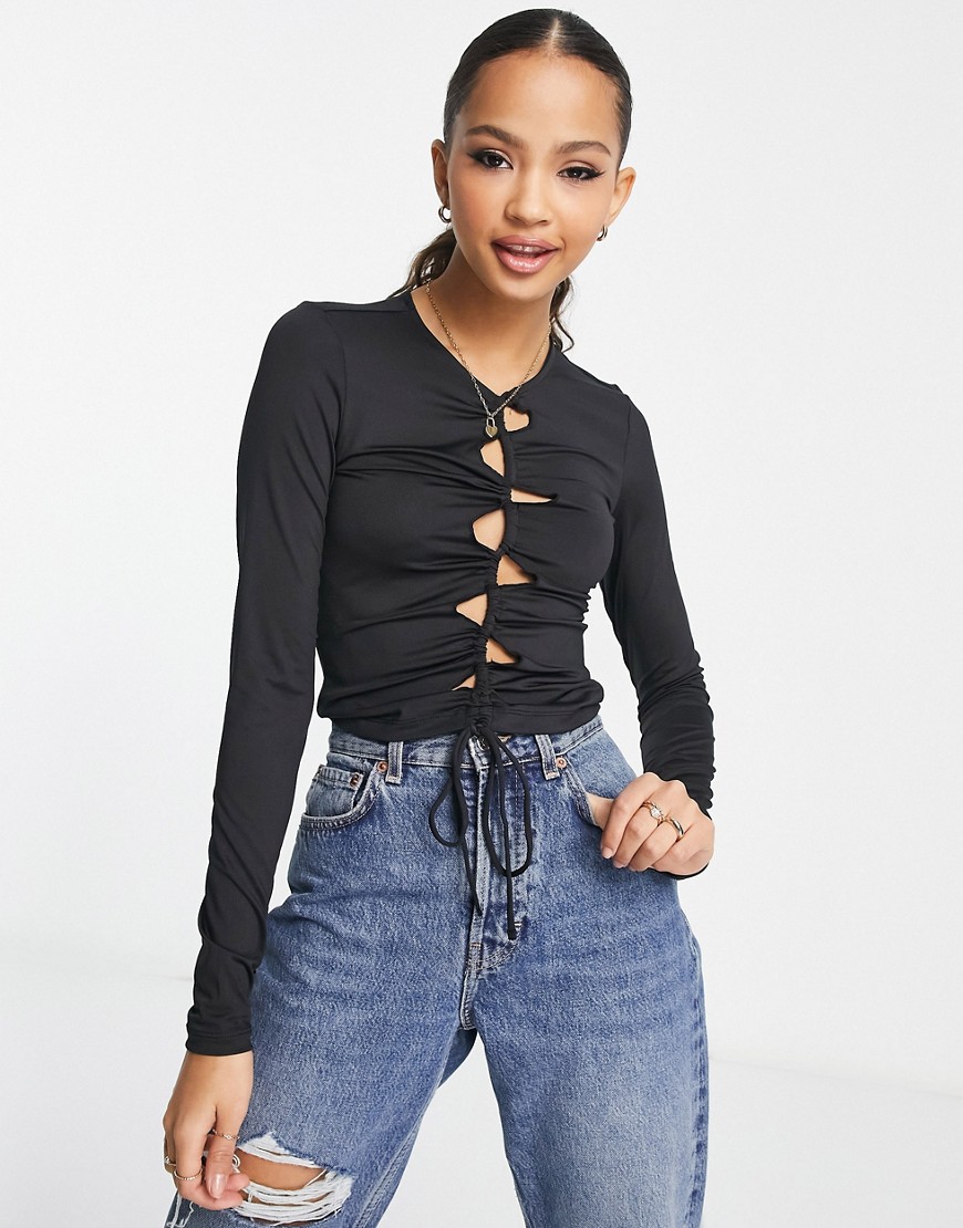 Monki cut-out drawstring long sleeve top in black