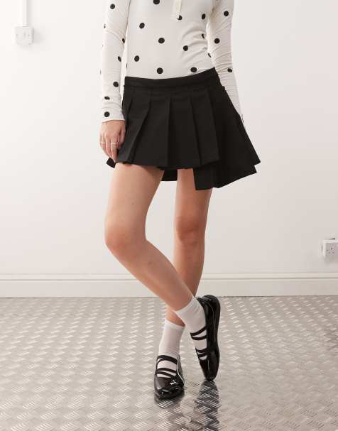 Monki pleated mini skirt with asymmetric hem in black