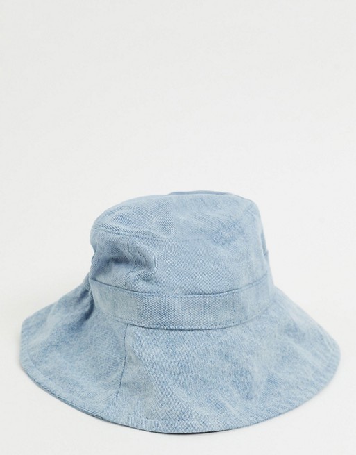 Monki Daisy denim bucket hat with ties in light blue