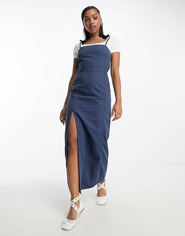 Monki - denim midi pinafore dress in mid wash blue