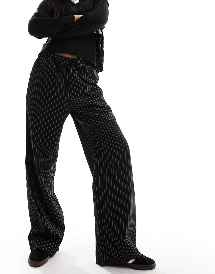 Monki drawstring straight leg trousers in black pinstripe