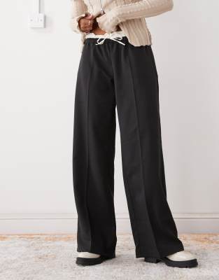 Monki - Elegante Schlupfhose aus Baumwolle in Schwarz mit Bund aus Baumwolle
