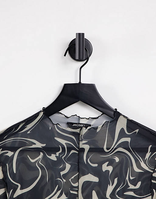 Tops Monki Fairly recycled swirl print mesh top in black 