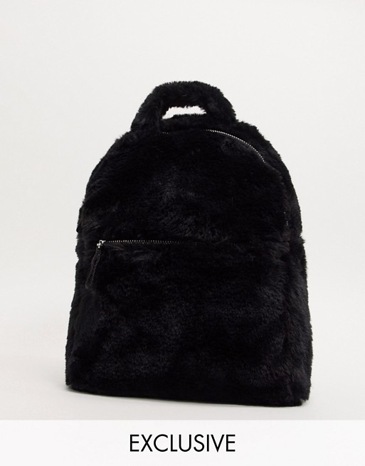 Monki faux fur backpack in black