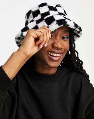 Monki faux fur checkerboard bucket hat in black and white