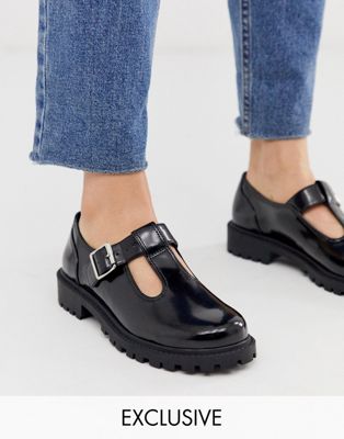 posture Blue shaver Monki faux leather shoes with buckle detail in black | ASOS