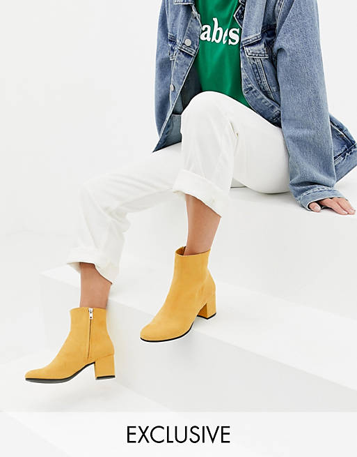 Monki faux suede heeled ankle boots in yellow