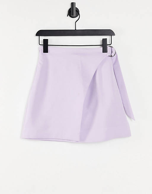 Women Monki Fergie wrap front mini skirt in lilac 