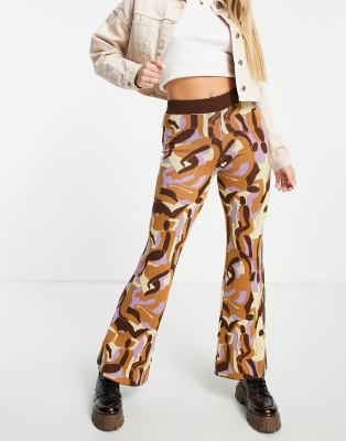 Monki figure print flare trousers in multi - view 1