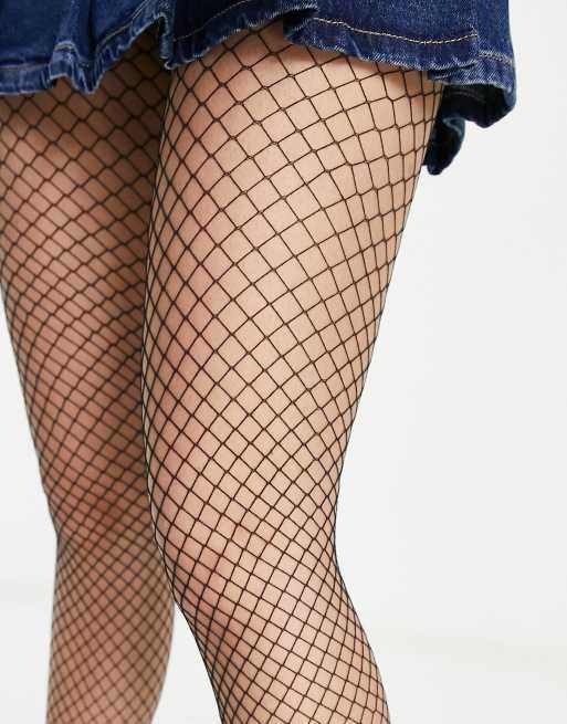 Monki fishnet tights in black