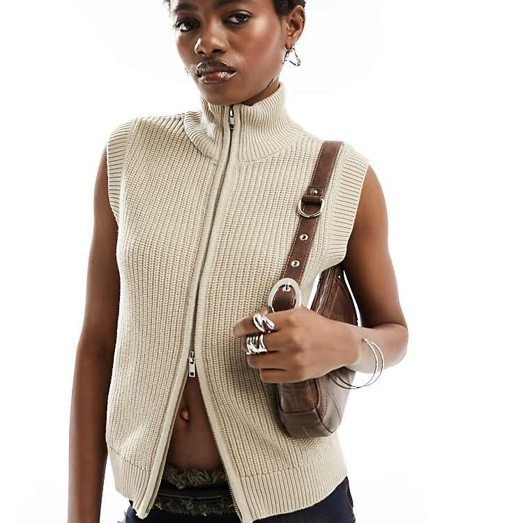 Monki fitted knitted vest top with front zip in two tone Monki fitted knitted vest top with front zip in two tone
