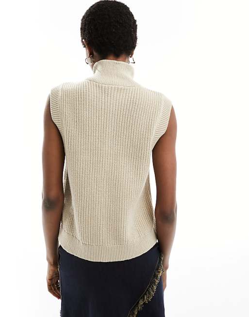 Monki fitted knitted vest top with front zip in two tone Monki fitted knitted vest top with front zip in two tone