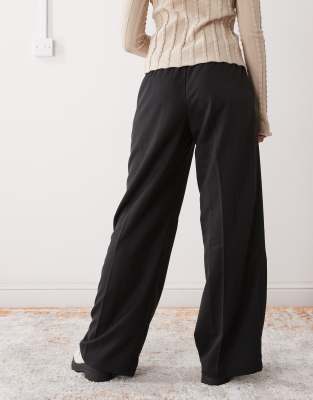 Monki Fitted Slit Hem Flared Pants In Black