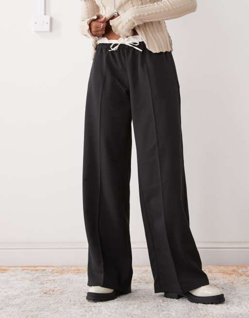 Monki fitted split hem flared trousers in black