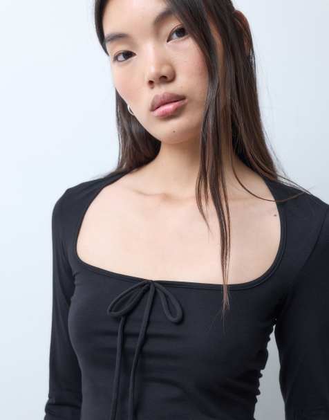 Monki flared long sleeve top in black 
