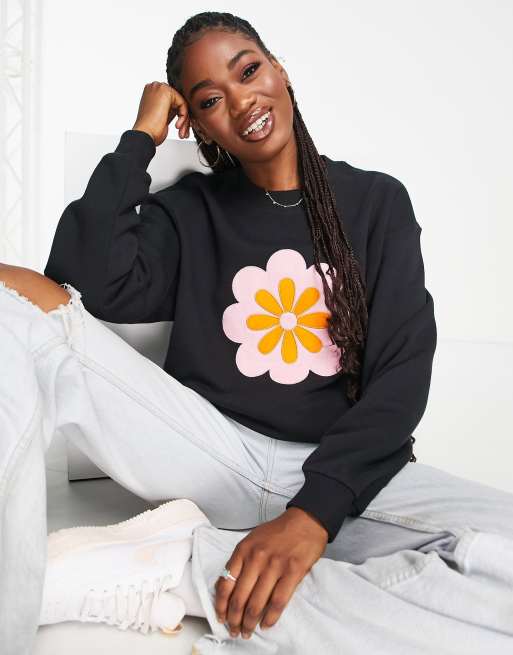 Monki flower print sweatshirt in black | ASOS