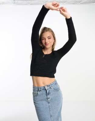 Monki fluffy  knit cropped long sleeve top in black