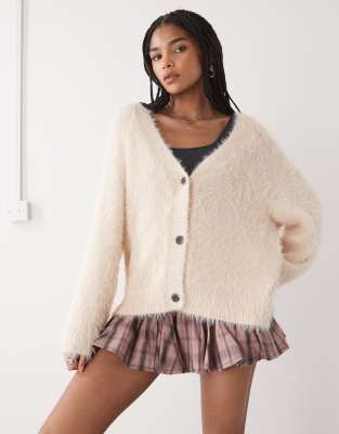 Gilet oversize en maille duveteuse boutonnée sur le devant - Rose clair S