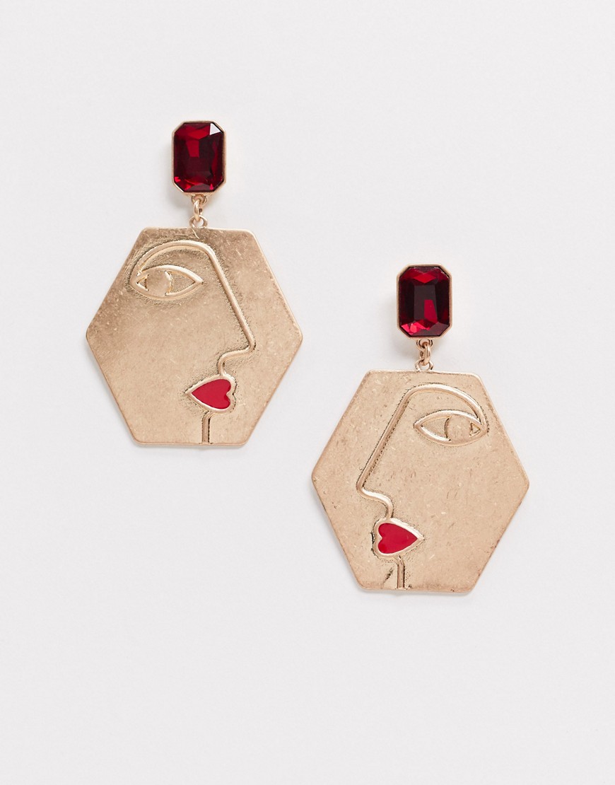 Monki – Guldfärgade hängande örhängen med slipade röda stenar
