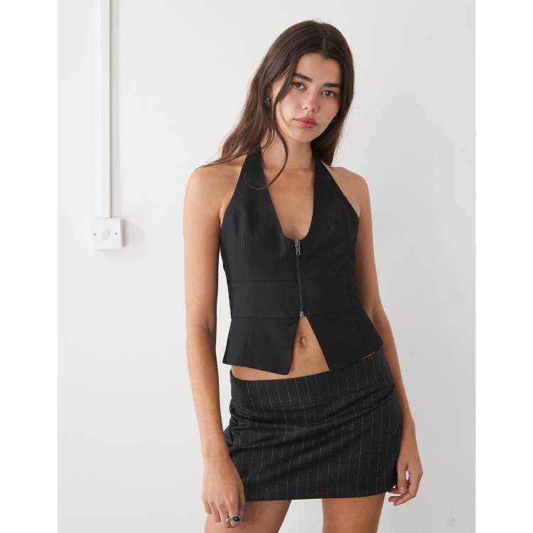 Monki halter neck open back zip front waistcoat in black | ASOS