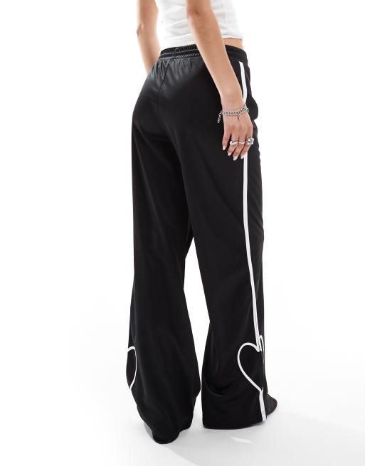 Monki heart stripe straight leg track pant trouser in black with