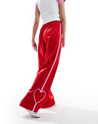 Monki heart stripe straight leg track pant trouser in red and pink