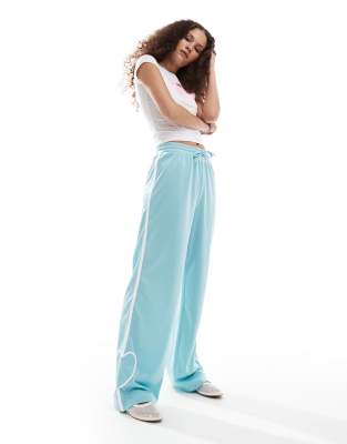heart stripe straight leg track pants in light blue with white stripes