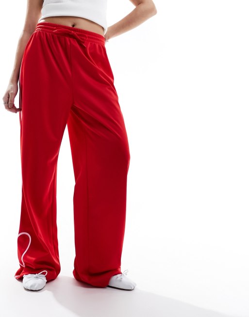 Monki heart stripe straight leg track pants in red and pink | ASOS