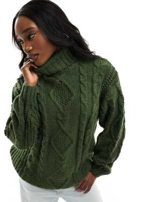 heavy cable knitted roll neck sweater in dark green