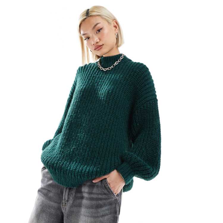 Monki high neck chunky rib knitted sweater with volume sleeve in dark green ASOS