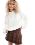 Monki high neck knitted sweater with cable pattern in ecru-White