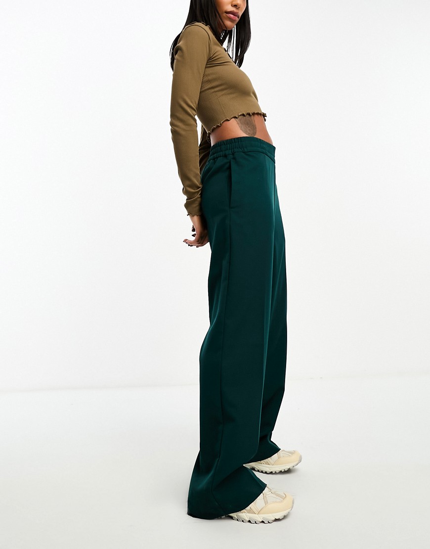Monki high pull-on flare trousers in dark green