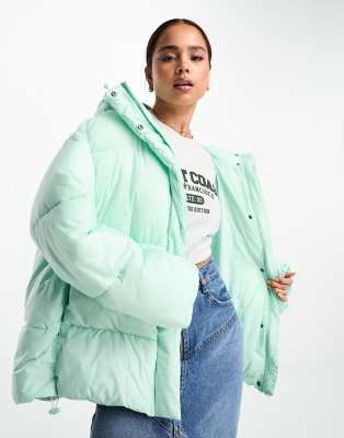 hooded puffer jacket in mint-Blue