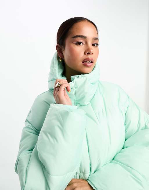 Mint green puffer coat on sale