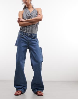 Monki Imoo cut-out back denim jeans in mid blue wash