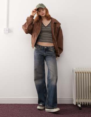 Monki - Imoo - Jeans a vita bassa lavaggio blu vintage con fondo ampio - view 1