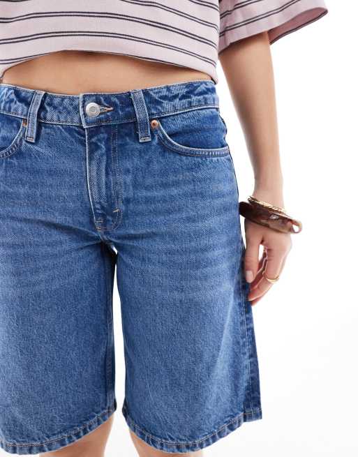 Monki Imoo low waist denim jorts in mid blue wash