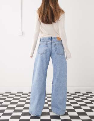 Monki Imoo Low Waist Wide Leg Jeans With Cut Out Bow Details