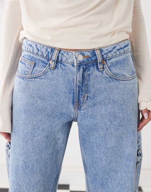 Monki Imoo low waist wide leg jeans with cut out bow details in light blue wash, 5 of 5