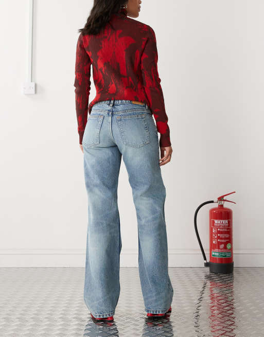 Monki Imoo low waisted wide fit jeans in mid blue