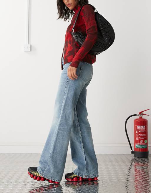 Monki Imoo low waisted wide fit jeans in mid blue